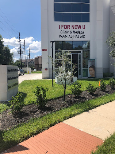 I FOR NEW U CLINIC IMAN Al-Haj MD